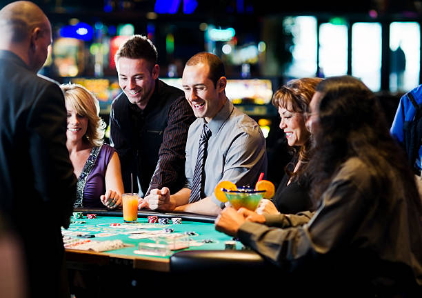 Mobile phone displaying live roulette table with betting interface and live dealer video